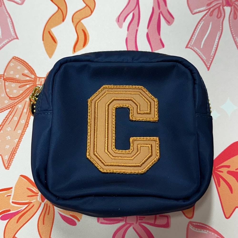 SCL Homecoming Sapphire Mini Pouch with “C” in tan